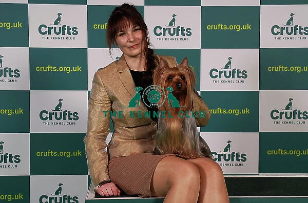 Saana Telkkala from Finland with Keksi, an Australian Silky Terrier, which was the Best of Breed winner today (Sunday 12. 03. 23), the last day of Crufts 2023, at the NEC Birmingham