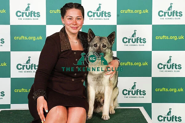 Sophie Wildig from Lincoln with Azlan, a Norwegian Elkhound, which was the Best of Breed winner today (Saturday 11. 03. 23), the third day of Crufts 2023, at the NEC Birmingham
