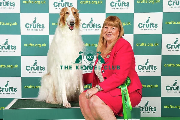 Sue Pinkerton from Exeter with Rory, a Borzoi, which was the Best of Breed winner today (Saturday 11. 03. 23), the third day of Crufts 2023, at the NEC Birmingham