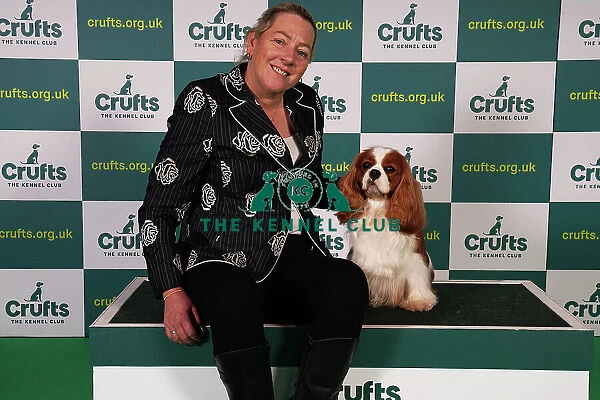 Tanya Ireland from Essex, with Dublin, a Cavalier King Charles Spaniel, which was the Best of Breed winner today (Sunday 12. 03. 23), the last day of Crufts 2023, at the NEC Birmingham