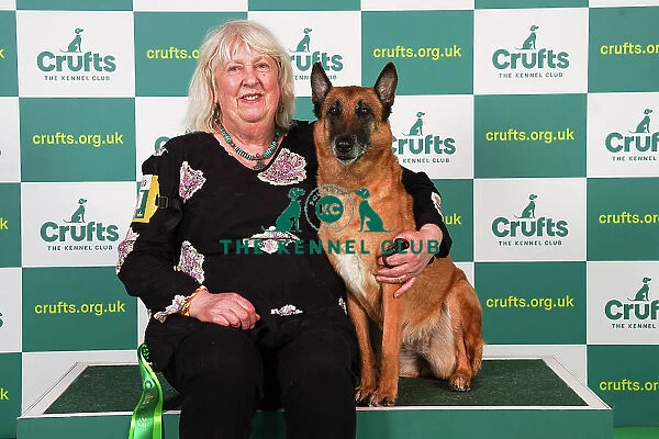 Tish Gafey from North Wales with Nova, a Belgian Shepherd Dog (Malinois), which was the Best of Breed winner today (Friday 10. 03. 23), the second day of Crufts 2023, at the NEC Birmingham