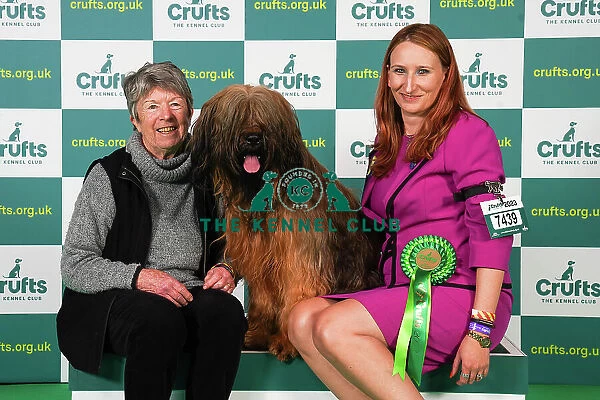 Toni Wescott-Smith and Pat Hartwell from Wokingham with Maisie, a Briard, which was the Best of Breed winner today (Friday 10. 03. 23), the second day of Crufts 2023, at the NEC Birmingham