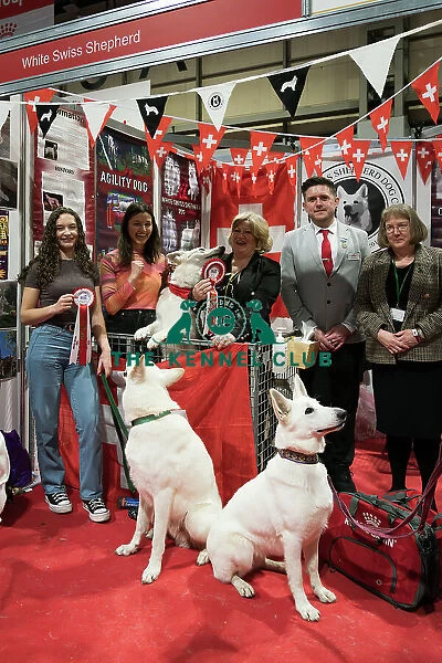 The White Swiss Shepherd Club being awarded the Best Discover Dogs Stand for the Pastoral Group and the Overall Winner for the Best Discover Dogs Stand at Crufts on Sunday 10th March 2024 by Alison Scutcher