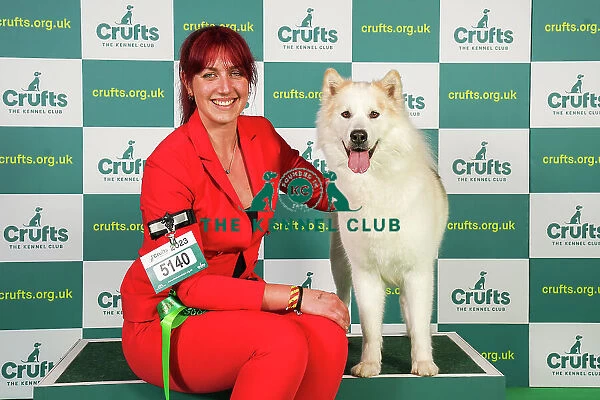 Yasmin Needham from Leicestershire with Nova, a Canadian Eskimo Dog, which was the Best of Breed winner today (Friday 10. 03. 23), the second day of Crufts 2023, at the NEC Birmingham