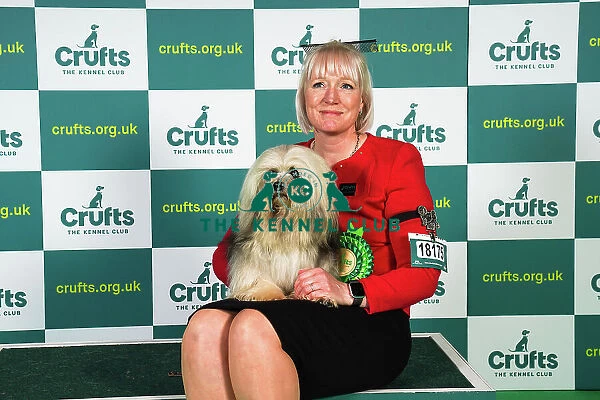 Zoe Richardson from Yorkshire, with Kenny, a Lowchen (Little Lion Dog), which was the Best of Breed winner today (Sunday 12. 03. 23), the last day of Crufts 2023, at the NEC Birmingham