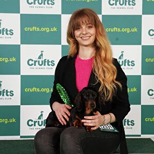 Aida Lamer from South Wales with Lucy, a Dachshund (Miniature Smooth Haired), which was the Best of Breed winner today (Saturday 11. 03. 23), the third day of Crufts 2023, at the NEC Birmingham