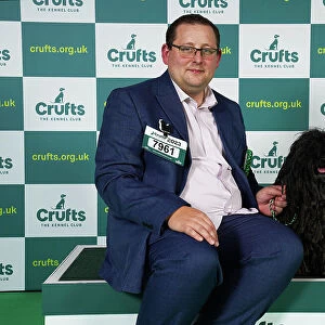 Andrew Henshaw from Northampton with Trixie, a Hungarian Puli, which was the Best of Breed winner today (Friday 10. 03. 23), the second day of Crufts 2023, at the NEC Birmingham