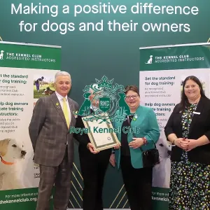 Christine Meaney receiving her KCAI certificate for Assistance Dogs with Paul Rawlings, Helen Kerfoot and Angela White, KCAI Vice Chair
