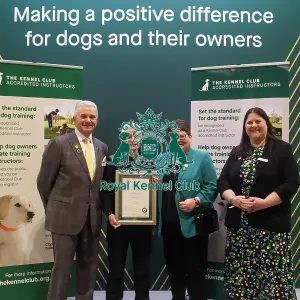 Diane Martin receiving her KCAI certificate for Companion Dog Training with Paul Rawlings, Helen Kerfoot and Angela White, KCAI Vice Chair