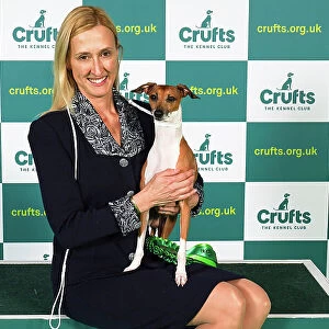 Dini Westerman from Canada, with Mojo, a Italian Greyhound, which was the Best of Breed winner today (Sunday 12. 03. 23), the last day of Crufts 2023, at the NEC Birmingham