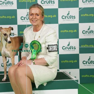 Heidi Bekkvang from Norway with Jasper, a Whippet, which was the Best of Breed winner today (Saturday 11. 03. 23), the third day of Crufts 2023, at the NEC Birmingham