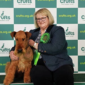 Julie Brown from Selsey with Herbie, a Airedale Terrier, which was the Best of Breed winner today (Saturday 11. 03. 23), the third day of Crufts 2023, at the NEC Birmingham