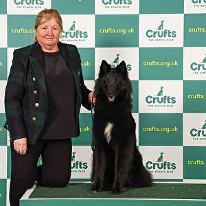 Linda Lester from Cheltenham with Envy, a Belgian Shepherd Dog (Groenendael), which was the Best of Breed winner today (Friday 10. 03. 23), the second day of Crufts 2023, at the NEC Birmingham