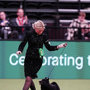 Lindsey McLachlan and Joanne McLachlan from The Wirral, with Stellon, a Schipperke, which was the Best of Breed winner today (Sunday 12. 03. 23), the last day of Crufts 2023, at the NEC Birmingham