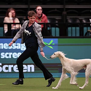 Michelle Ulyatt and Linda Aldous from Bexhill on Sea with Storm a Saluki, which was the Best of Breed winner today (Saturday 11. 03. 23), the third day of Crufts 2023, at the NEC Birmingham