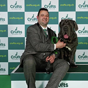 Mike Evans from Boston with Unica, a Neapolitan Mastiff, which was the Best of Breed winner today (Friday 10. 03. 23), the second day of Crufts 2023, at the NEC Birmingham