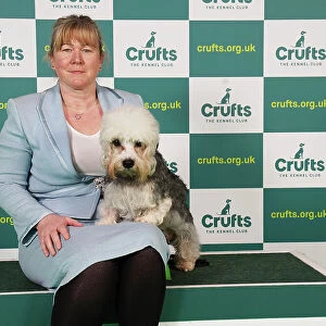 Nicole Hume from Strotfold with Pasha, a Dandie Dinmont Terrier, which was the Best of Breed winner today (Saturday 11. 03. 23), the third day of Crufts 2023, at the NEC Birmingham