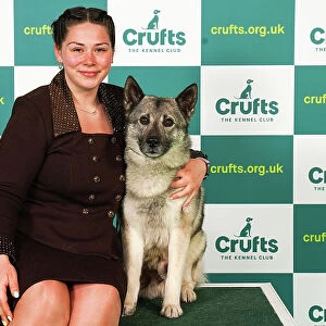 Sophie Wildig from Lincoln with Azlan, a Norwegian Elkhound, which was the Best of Breed winner today (Saturday 11. 03. 23), the third day of Crufts 2023, at the NEC Birmingham