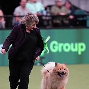 Susie Reynolds and Stacey Watkins from Brighton, with Ruby, a Eurasier, which was the Best of Breed winner today (Sunday 12. 03. 23), the last day of Crufts 2023, at the NEC Birmingham
