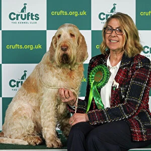 Trudi Jones from Pembrokeshire with Flossy, an Italian Spinone, which was the Best of Breed winner today (Thursday 09. 03. 23), the first day of Crufts 2023, at the NEC Birmingham