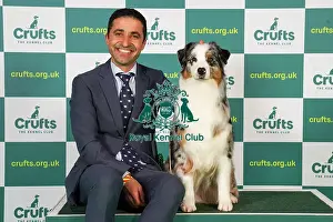 Artur Bullani from Italy with Queen, an Australian Shepherd, which was the Best of Breed winner today (Friday 10. 03. 23), the second day of Crufts 2023, at the NEC Birmingham