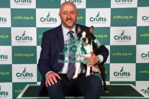 Dave Bennett from Liverpool, with Ted, a Boston Terrier, which was the Best of Breed winner today (Sunday 12. 03. 23), the last day of Crufts 2023, at the NEC Birmingham