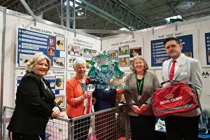 The French Bulldog Club being awarded the Best Discover Dogs Stand for the Utility Group at Crufts on Sunday 10th March 2024 by Alison Scutcher, Nicky Ackerley-Kemp (Directors at The Kennel Club) and Ricky Furnell from Royal Canin