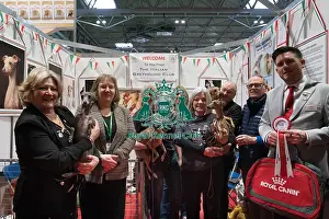 The Italian Greyhound Club being awarded the Best Discover Dogs Stand for the Toy Group at Crufts on Sunday 10th March 2024 by Alison Scutcher, Nicky Ackerley-Kemp (Directors at The Kennel Club) and Ricky Furnell from Royal Canin