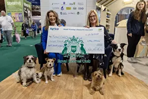 Vicki Wentworth Prints: Jennifer Millard - Chair of the Kennel Club Charitable Trust is presented by with a cheque by Vicki Wentworth CEO AGRI