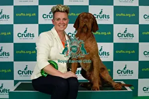 Jo Lumasia from Lanark with Nacho, a Wirehaired Vizsla, which was the Best of Breed winner today (Thursday 09. 03. 23), the first day of Crufts 2023, at the NEC Birmingham
