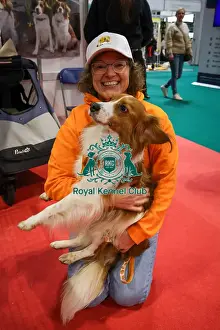 Kooikerhondje Prints: Kooikerhondje with owner at Discover Dogs