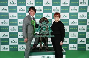 Lesley Chappell and Adam Chappell from Matlock with Guy, a Great Dane, which was the Best of Breed winner today (Friday 10. 03. 23), the second day of Crufts 2023, at the NEC Birmingham