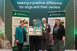 Lillie Abbot receiving her KCAI certificate for the Kennel Club Accredited Training Scheme with Paul Rawlings, Helen Kerfoot and Angela White, KCAI Vice Chair