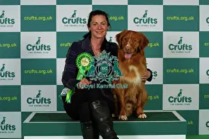 Michelle Elkin from Rickmansworth with Quentin, a Nova Scotia Duck Tolling Retriever, which was the Best of Breed winner today (Thursday 09. 03. 23), the first day of Crufts 2023, at the NEC Birmingham
