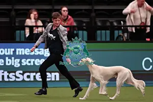 Michelle Ulyatt and Linda Aldous from Bexhill on Sea with Storm a Saluki, which was the Best of Breed winner today (Saturday 11. 03. 23), the third day of Crufts 2023, at the NEC Birmingham