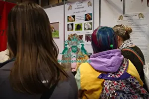 Pomeranian Prints: Pomeranian at Discover Dogs with owner