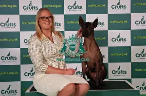 Whitney Meeks from Indiana, USA, with Itzia, a Xoloitzcuintle (Mexican Hairless) (Standard), which was the Best of Breed winner today (Sunday 12. 03. 23), the last day of Crufts 2023, at the NEC Birmingham